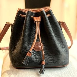 Vintage Dooney and Bourke Pebbled Leather Bucket Bag with brass accents